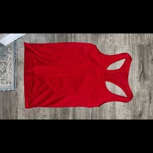 size 8 lululemon red tank top feels like new, no tags
